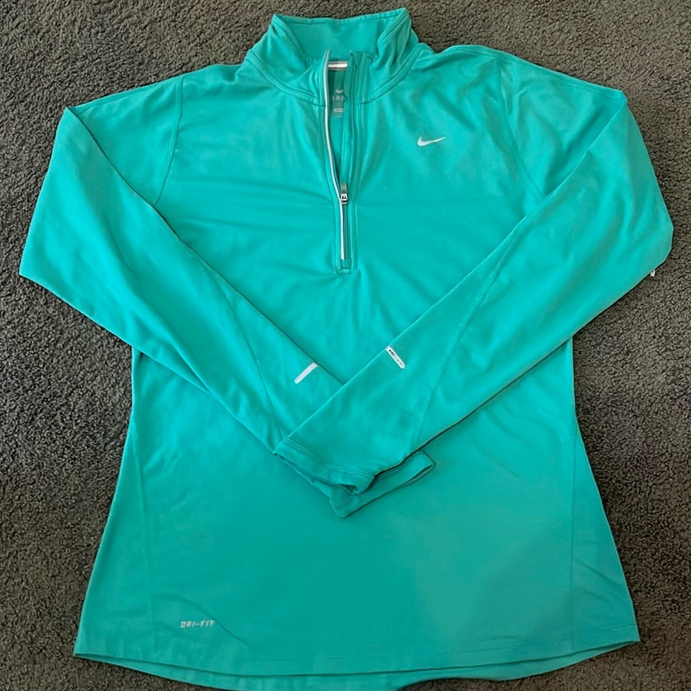 Nike women’s 1/4 zip jacket. Size M